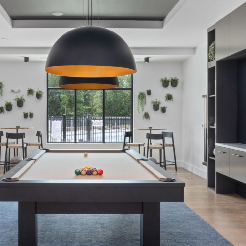 Your new favorite social area billiards table in residents' clubhouse
