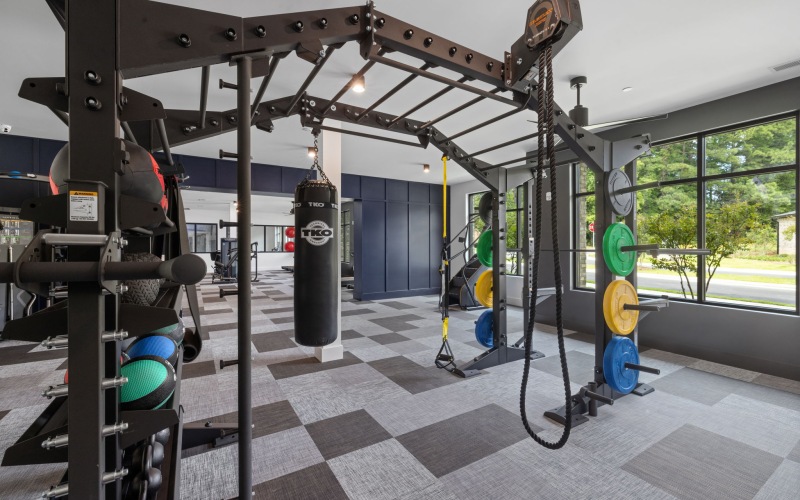 spacious fitness center with free weights