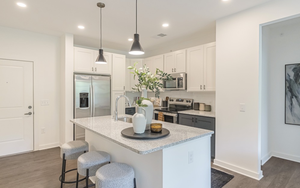 B1.5 - 2 bedroom floorplan layout with 2 bathrooms and 1073 square feet (Gourmet Designer Kitchen)