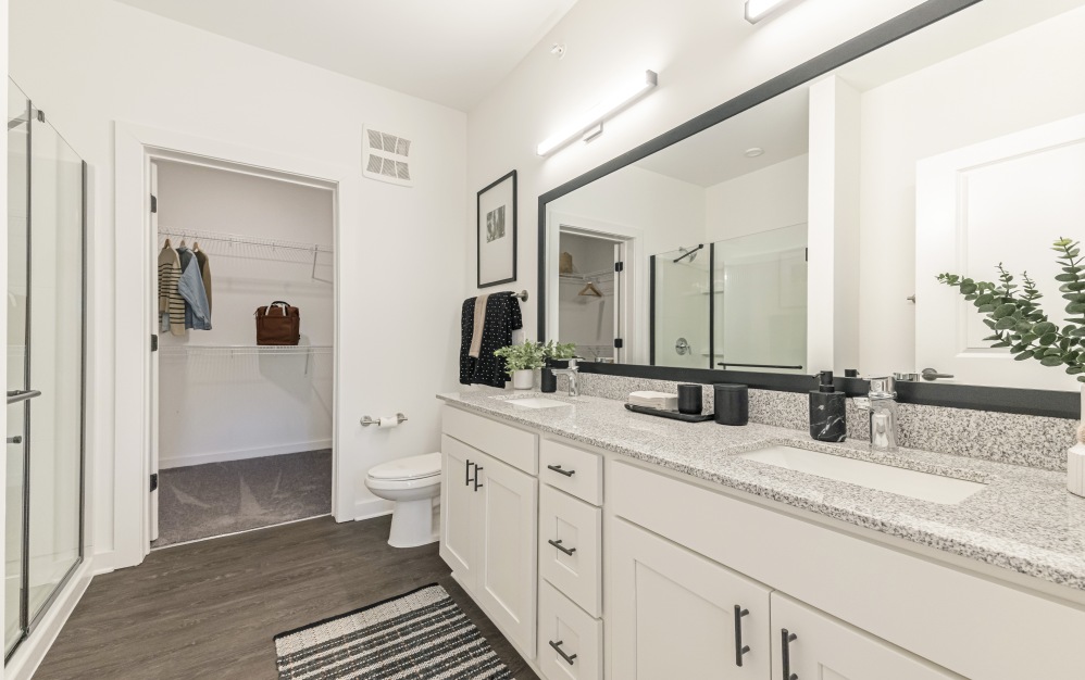 B1.5 - 2 bedroom floorplan layout with 2 bathrooms and 1073 square feet (Spa-Inspired Primary Bathroom)