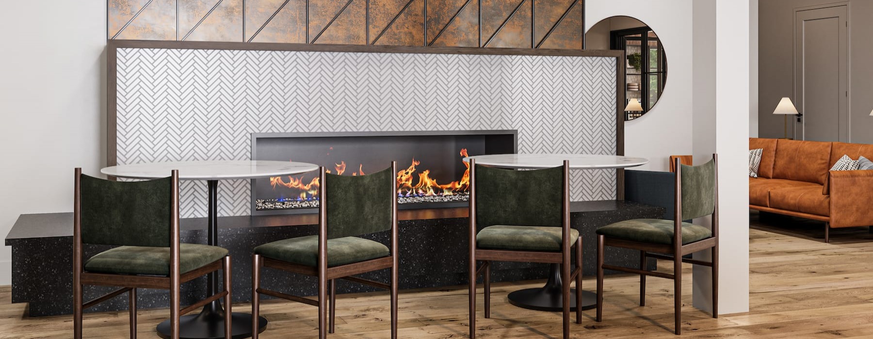 club room with a fireplace and chairs