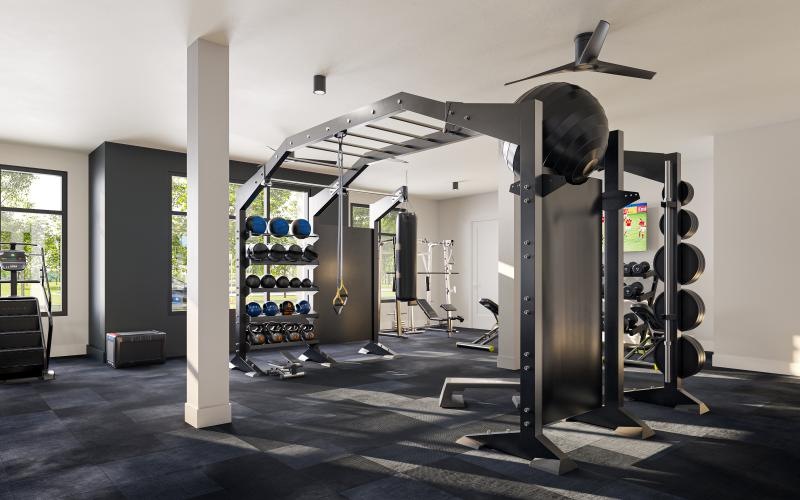 spacious fitness center with free weights